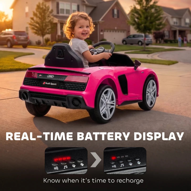 Pink kids electric convertible ride-on car with child driving and rear lights