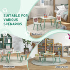 Green kids table with two chairs and a matching art easel for creative play.