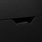 Black recessed curved drawer handle detail from a seven-drawer cabinet