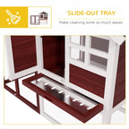 Slide-out cleaning tray inside maroon and white rabbit hutch, mesh base and doors