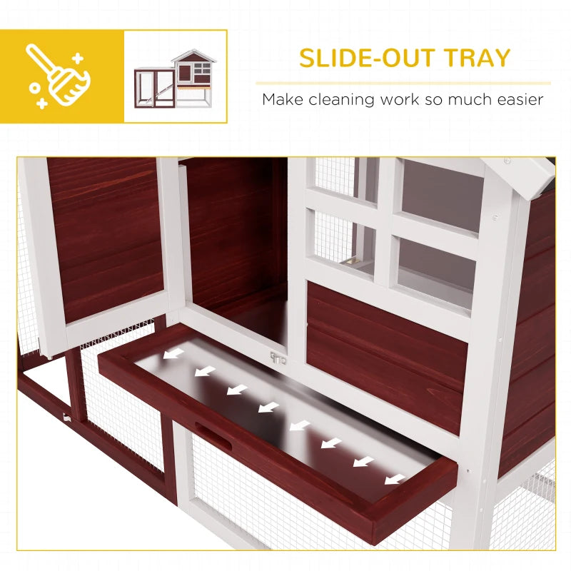 Slide-out cleaning tray inside maroon and white rabbit hutch, mesh base and doors
