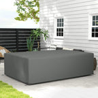 Dark grey rectangular patio furniture cover fitted over an outdoor sofa or bench