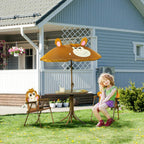 Kids outdoor table-and-chair set with round table and two brown folding chairs under monkey umbrella