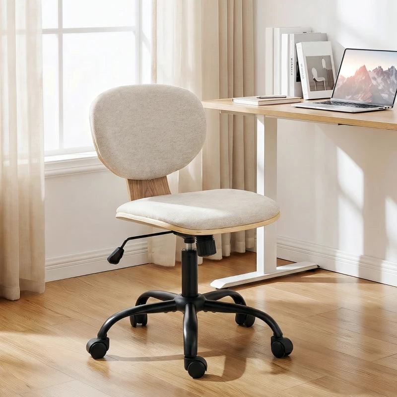 Light grey upholstered office rocking chair with round back, swivel base, and caster wheels.
