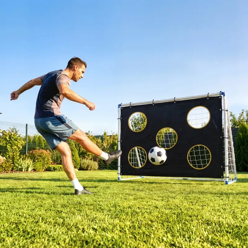 Portable football goal with black target panel, five yellow-ring circles, white net