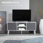 White TV stand with flat-screen TV and two grey drawers, open middle for media storage