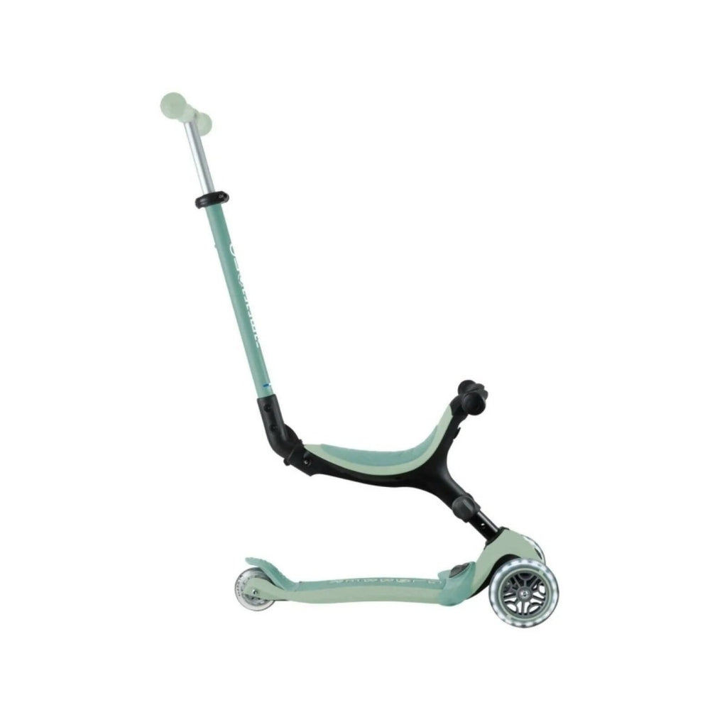 Pistachio kick scooter with tall stem, black steering column, three wheels