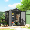 Dark grey garden storage shed with open doors and organized interior shelving