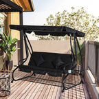 Black three-seater garden swing bed on outdoor deck with canopy and seat cushions