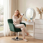 Dark green velvet swivel tub chair with contoured back and cushioned seat