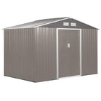 Grey metal storage shed with double sliding doors and sloped roof, foundation-ready design