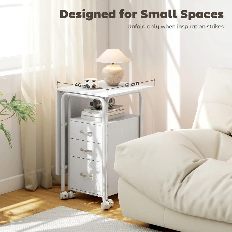 White foldable office desk with 3 drawers, extendable top, caster wheels in small space