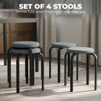 Set of 4 dark grey round cushioned backless stools with black legs