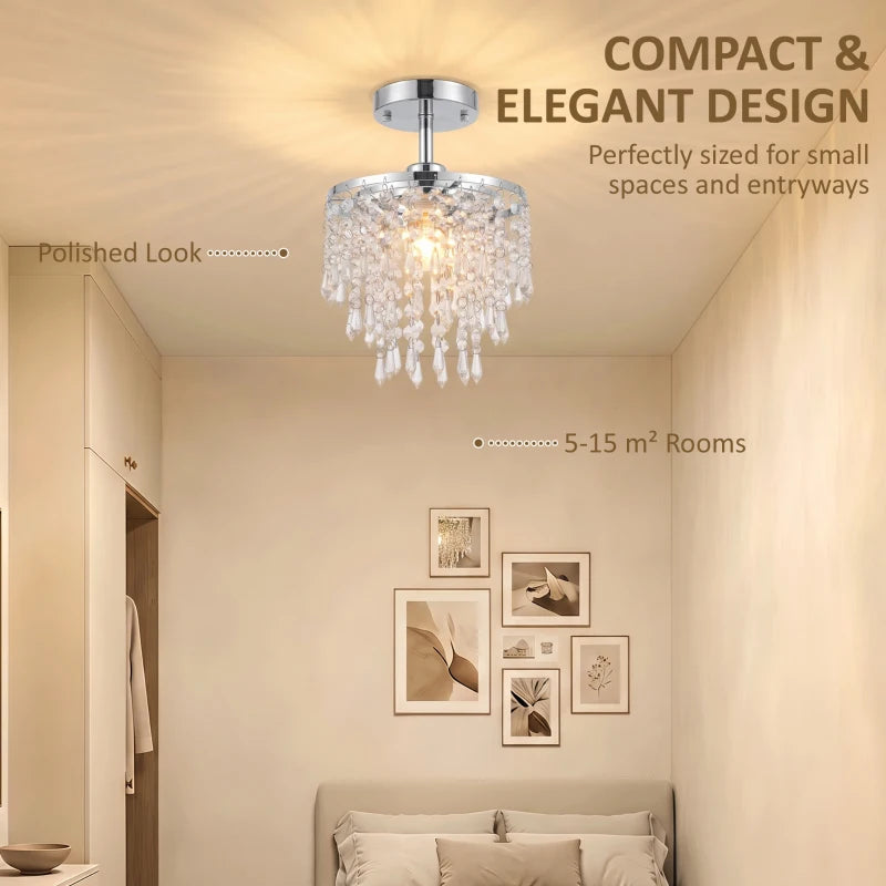 Ceiling crystal light with silver canopy, clear dangling drops, and warm bulb glow