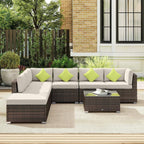 Brown rattan corner sofa set with white cushions, lime pillows, and glass-top coffee table