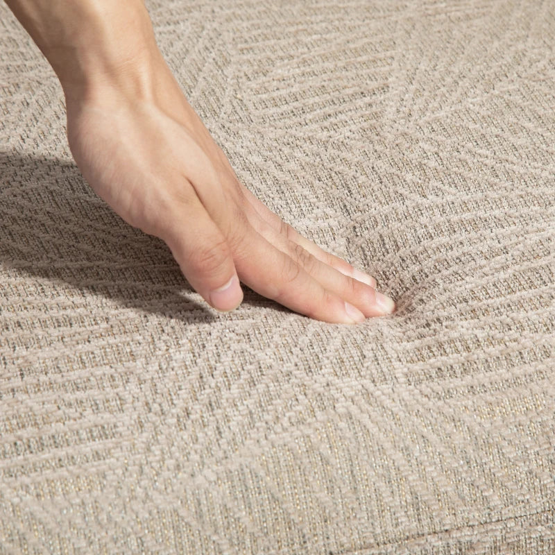 Khaki upholstered recliner chair fabric texture close-up