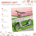 White kids kick scooter with black deck and handlebars, front wheel and kickstand