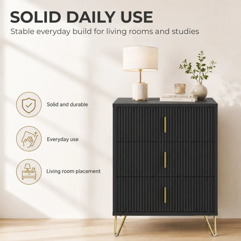 Black 3-drawer dresser with fluted fronts, gold bar handles, and angled metal legs.