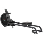 Black rowing machine with digital monitor, padded seat, and adjustable foot pedals.