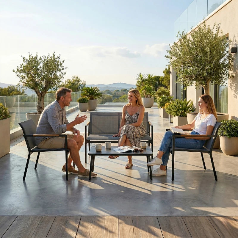 Grey outdoor seating set arranged for four people with metal coffee table