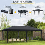 Black pop-up gazebo canopy tent with pop-up frame, set up in backyard