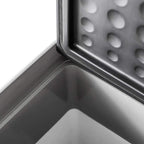 Grey cooler interior with metal cooling plate and textured drainage surface