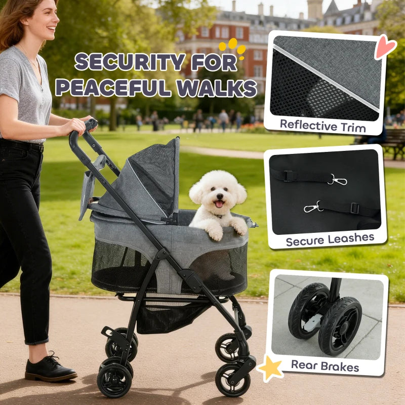 Grey pet stroller with reflective trim, secure leash clips, and rear wheel brakes