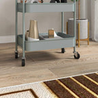 Light blue three-tier steel storage trolley base with caster wheels and stored items
