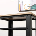 Corner view of oak tabletop on black metal side table with sturdy brackets
