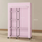 Pink fabric wardrobe with hanging rail and shelves, foldable unit on rolling casters.