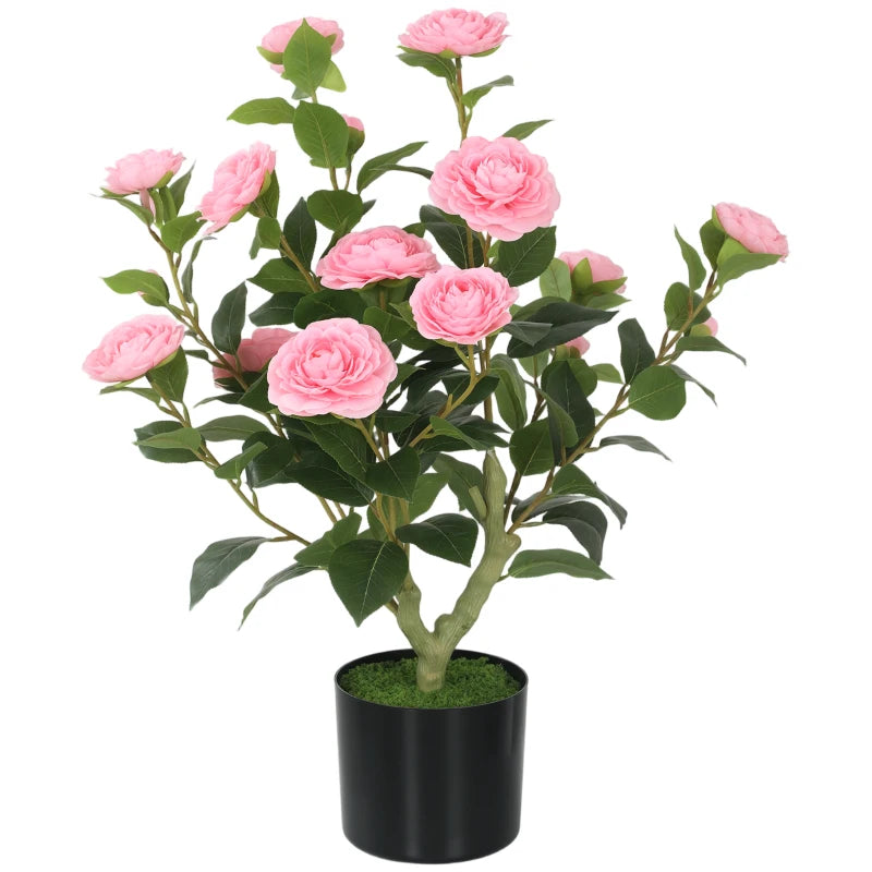 Pink artificial camellia flower plant in a black pot with green leaves