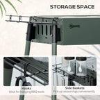 Green portable charcoal BBQ grill with side hooks and seasoning storage baskets