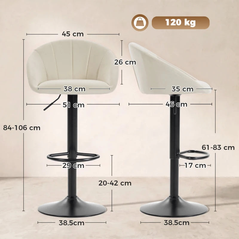 Pair of cream counter stools with curved backs and black round pedestal bases