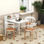 White folding drop-leaf dining table with built-in shelves, styled with chairs in a room