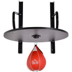 Wall-mounted speed ball platform stand with gray base, black uprights, and red hanging bag