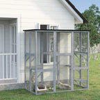 Light grey catio outdoor enclosure with wire mesh panels, platforms, and open door area.