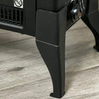 Black electric fireplace stove heater with textured side panel and four angled feet