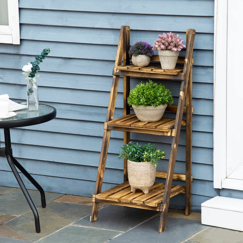Brown wooden 3-tier folding flower pot stand on outdoor patio with four planters