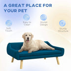 Blue dog couch sofa bed with soft cushion and wooden frame, pet resting on top