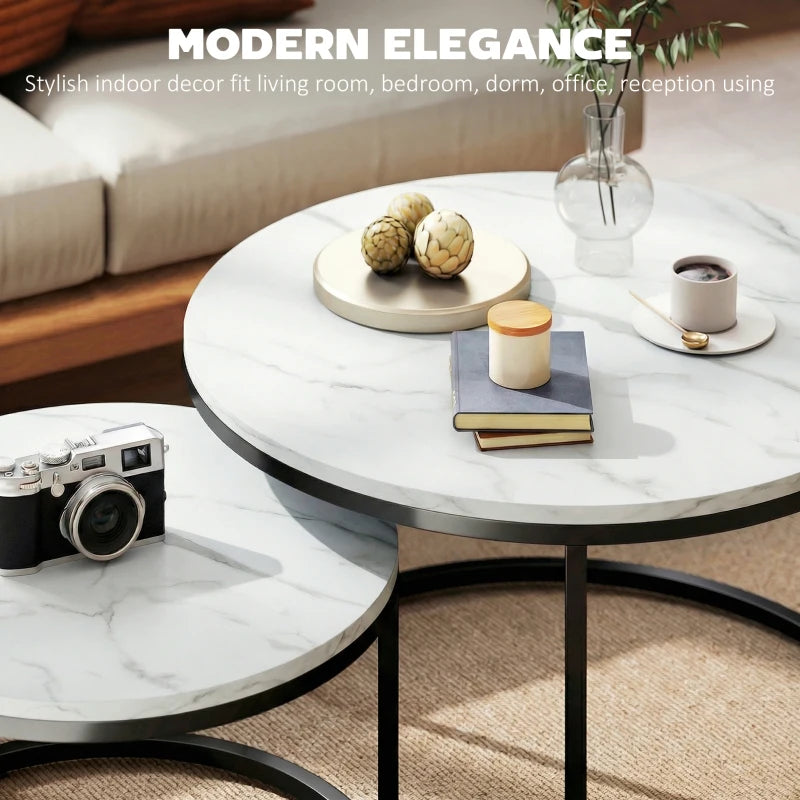Round marble-effect nesting table set with white tops and black bases