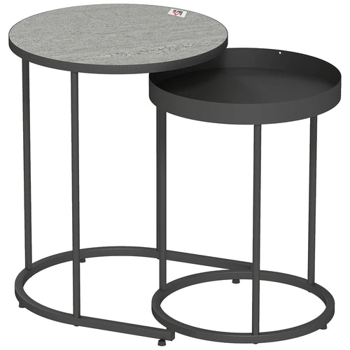 Set of two nesting tables with round grey tops and dark metal frames, tables nested together