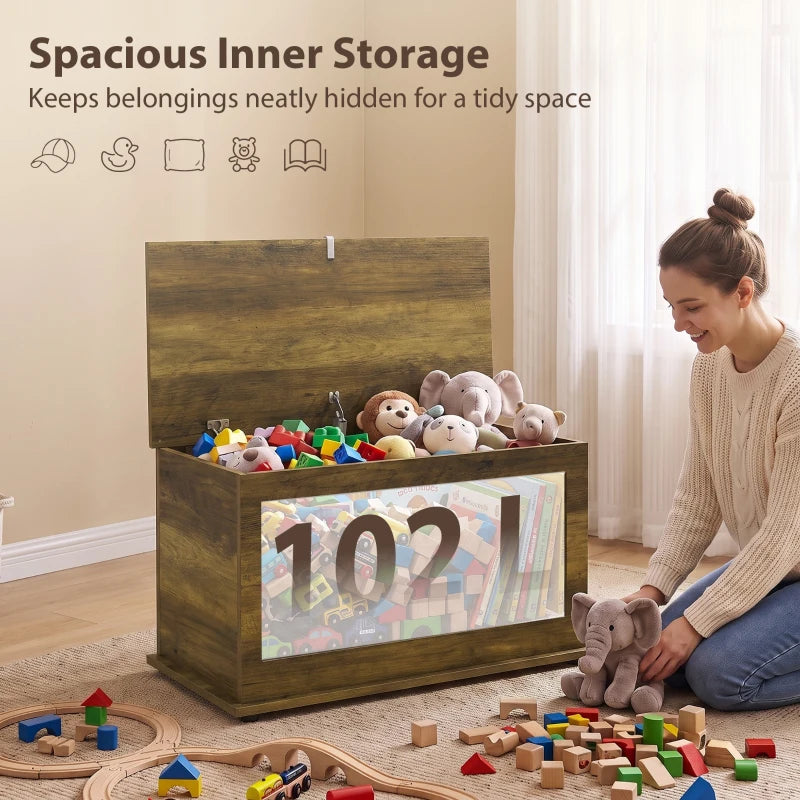 Brown storage chest with open hinged lid holding stuffed toys and blankets inside.