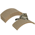 Two arched tan-brown cardboard cat scratchers with a cat resting on top