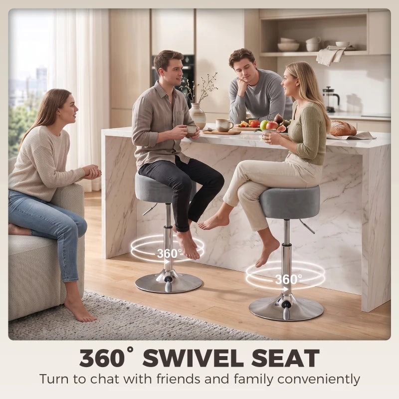 Grey round bar stool with swivel seat, chrome base, and footrest for 360° turning