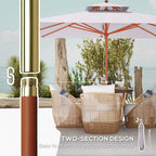 Grey square parasol with orange ribs and jointed wooden pole, compact design detail.