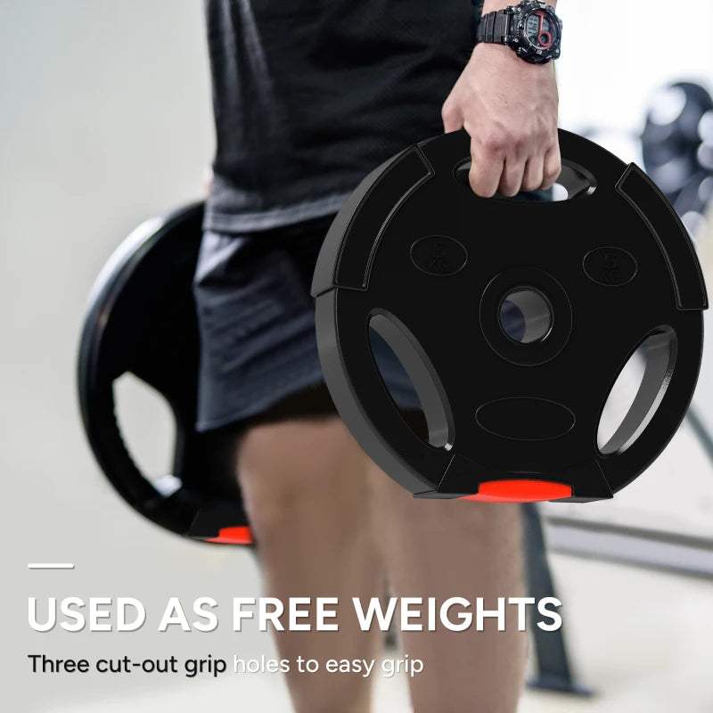 Black weight plate held by hand, three grip holes, orange edge accent