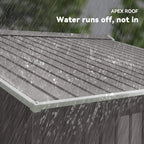 Grey metal storage shed roof with water running off along the edge under rain