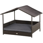 Elevated rattan dog bed with canopy, grey cushion, and open front for small dogs