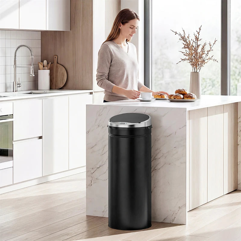 Black 50L automatic motion sensor rubbish bin with closed lid in a modern kitchen