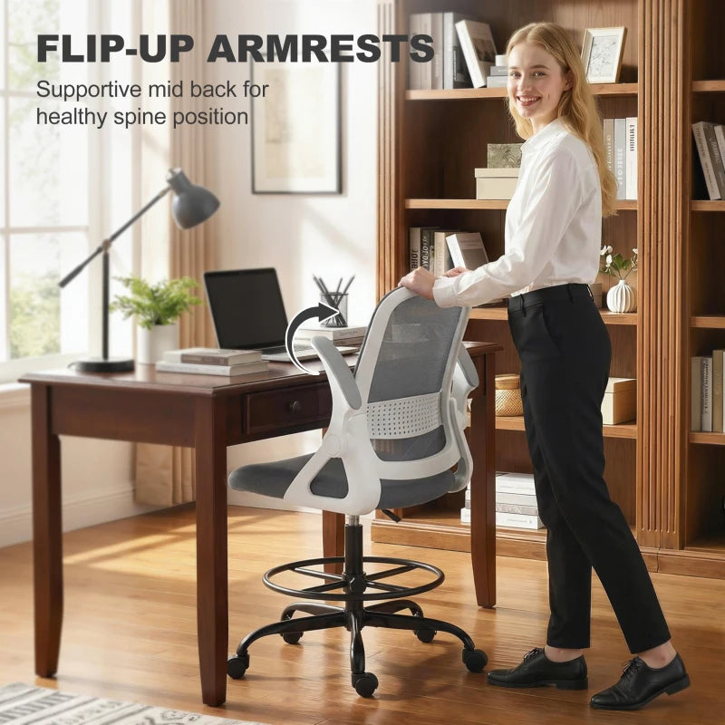 Grey mesh computer chair with flip-up armrests, shown raised for clearance.
